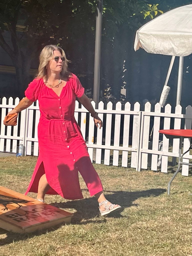 Angela playing cornhole at Derby Days