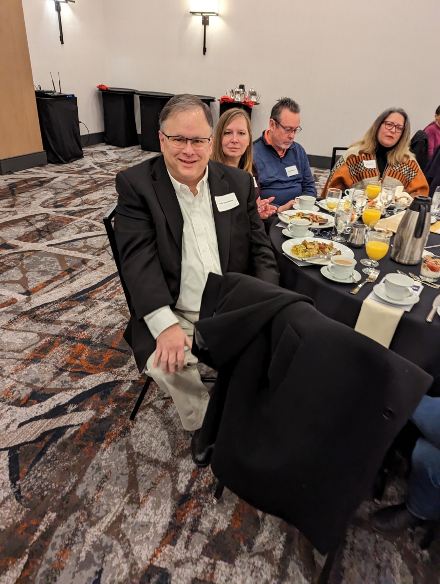 Table of supporters at Angela's campaign kickoff breakfast
