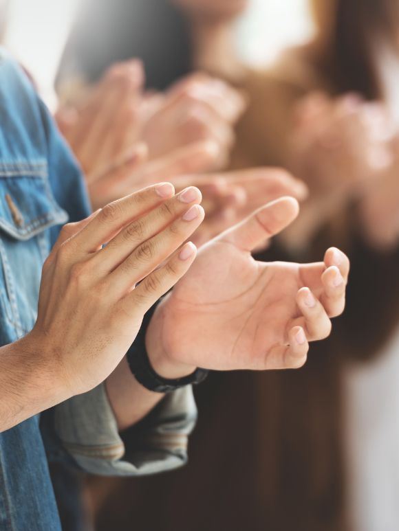 Two hands applauding