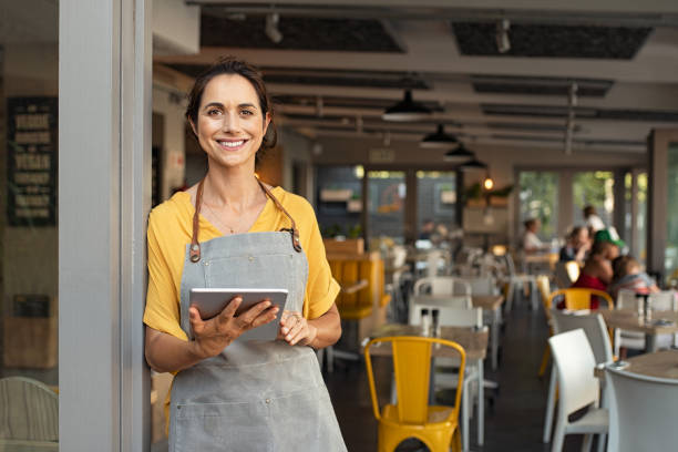 Smiling restaurant owner